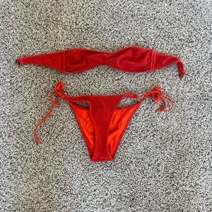 Triangle red swimsuit, top size small and bottoms size small aswell
